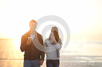 Theres nothing like young love. a young woman at the beach. Stock Photo