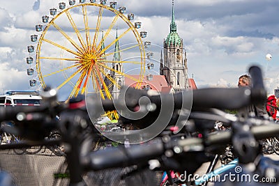 theresienwiese, munich, germany, 2019 april 27: St Paul church with ferris wheel in the background from the flea market in bavaria Cartoon Illustration