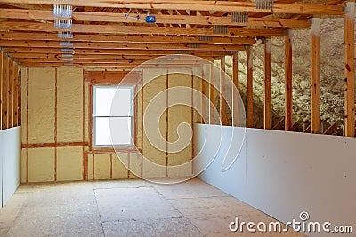 thermal and hidro insulation with spray foam at house construction Stock Photo