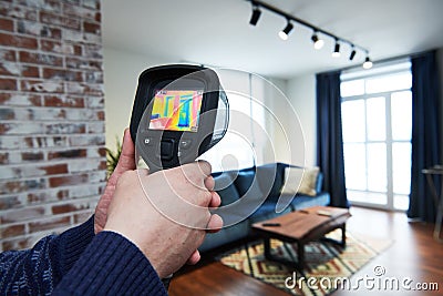 Thermal imaging camera inspection of building. check temperature Stock Photo