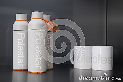 Thermal mug, black thermos, bottle with logo Polestar in showcase, original accessory, custom-made for fans of Polestar vehicle, Editorial Stock Photo