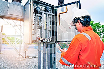 Thermal scan and then send the image data to the tablet to check for faults in equipment, or preventive maintenance to reduce the Stock Photo