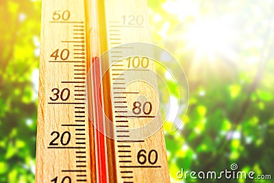 Thermometer displaying high 40 degree hot temperatures in sun summer day. Stock Photo