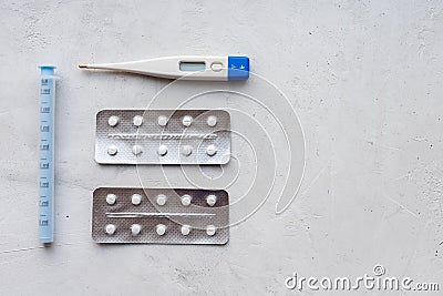 Thermometer, pills and antipyretics for the first symptoms of coronavirus Stock Photo