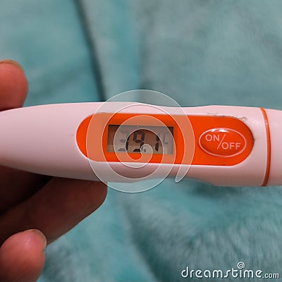 A thermometer shown the result of body temperature measure of 39 degree celcius Stock Photo