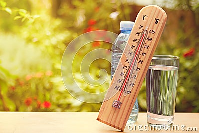 Thermometer on summer day showing near 45 degrees Stock Photo