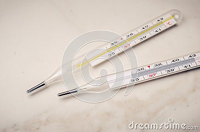 Thermometers on Two thermometers on white background/white background Stock Photo