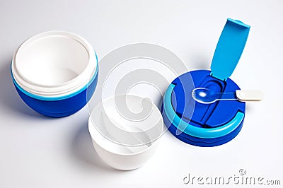 Thermos for food new, plastic, blue with spoon on white background Stock Photo