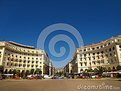 Thessaloniki, Greece - Pedestrians and traffic in Aristotelous Square Editorial Stock Photo
