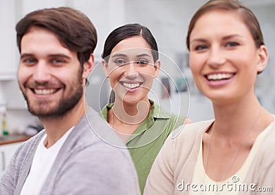 Theyre a dream team. three work colleagues in the office. Stock Photo