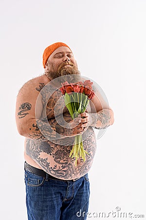 https://thumbs.dreamstime.com/x/thick-bearded-guy-flowers-happy-fat-man-holding-bouquet-tulips-smiling-standing-smelling-his-eyes-75903132.jpg