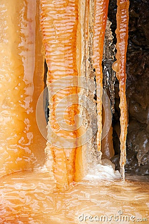 Thick bold orange icicles Stock Photo