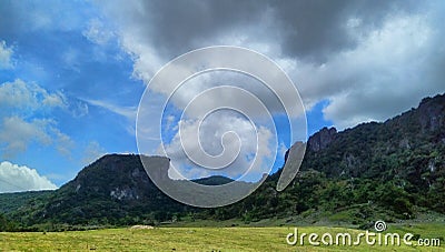 Thick clouds in between hills of Mundo Perdido, Timor-Leste Stock Photo