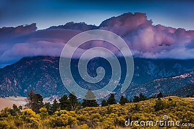 Thick Clouds over the Sangre de Cristo Mountains Great Sand Dune Stock Photo