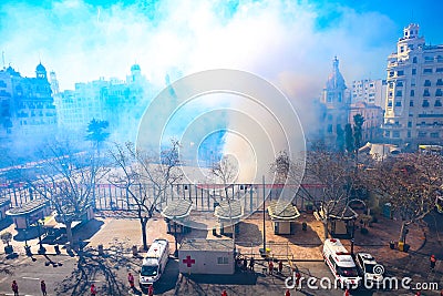 Thick clouds of smoke during a Mascleta of the 2020 Fallas festival of Valencia Editorial Stock Photo