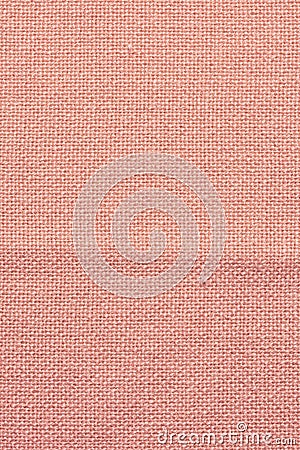 Thick fabric is dirty orange. Texture of coarse fabric, closeup. Stock Photo