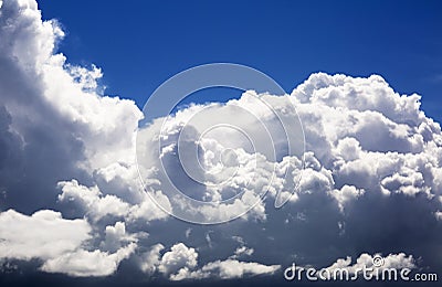 Thick fluffy clouds high in the sky, the landscape. Stock Photo