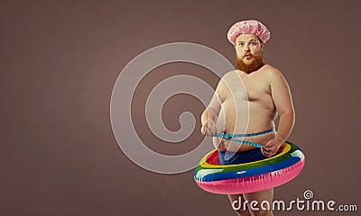 Thick funny man in the inflatable circle Stock Photo
