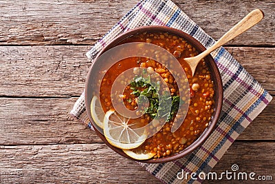 Thick Moroccan soup in a bowl on the table. horizontal view from Stock Photo