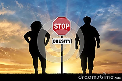 Thick pair and stop sign obesity Stock Photo