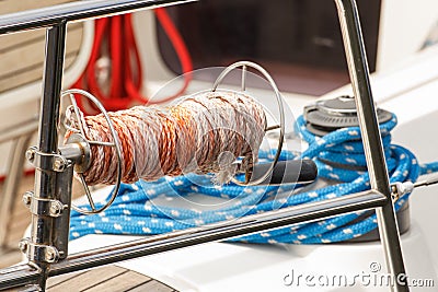 Thick rope on deck of yacht, detail of yachting Stock Photo