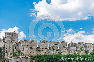 Thick stone walls of the fortress Mamula. Stock Photo