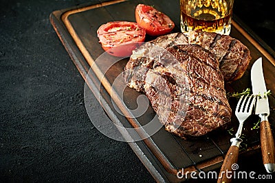 Thick tender grilled rump or sirloin beef steak Stock Photo