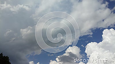 Thick white clouds on blue sky background Stock Photo