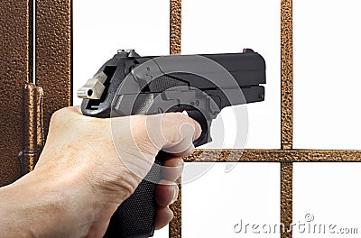 Thief armed with a pistol Stock Photo