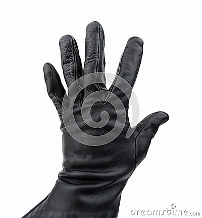 Thief with black glove Stock Photo