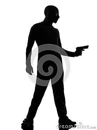 Thief criminal terrorist aiming gun man Stock Photo