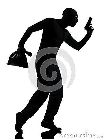 Thief criminal terrorist aiming gun man Stock Photo