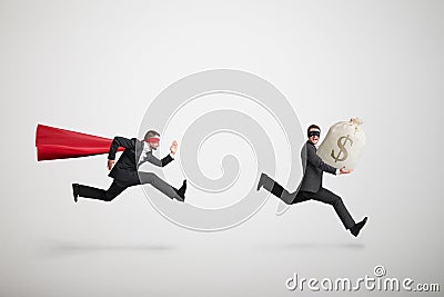 Thief stole the money and running away Stock Photo