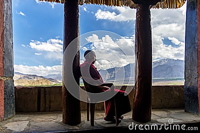 Monk resting in Thikse gompa in Ladakh region, India Editorial Stock Photo