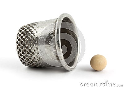 Thimble and pea Stock Photo