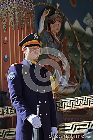 THIMPHU, BHUTAN - DEC 3, 2017: Royal honour guard on duty in front of the Tashichho Dzong Editorial Stock Photo