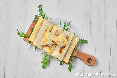 Thin crepe stuffed with chicken giblets Stock Photo