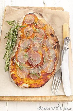 Thin flat bread pizza with potato Stock Photo