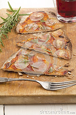 Thin flat bread pizza with potato Stock Photo