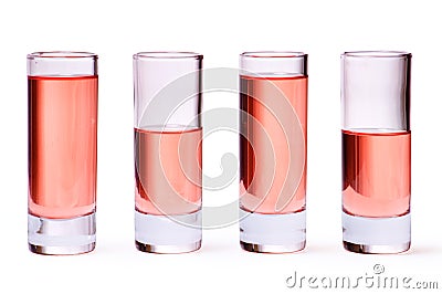 Thin glasses with pink liquid Stock Photo