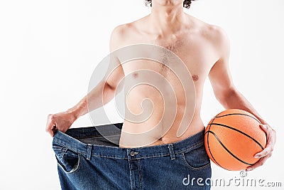 Thin guy presenting result of sport activity Stock Photo