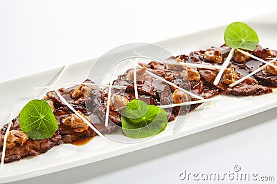 Thin Slices of Spicy Roast Beef Stew with Brown Mushroom Sauce Stock Photo