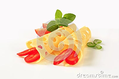 Thin slices of Swiss cheese Stock Photo