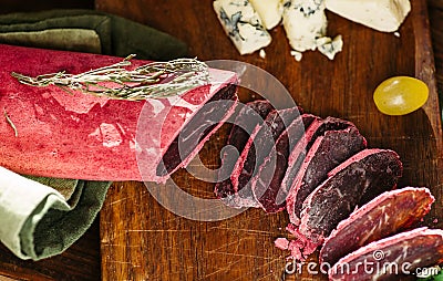 Thin slicing jerked sausage Stock Photo