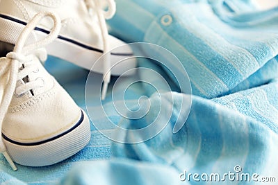 Things for little boy, set of clothes, bodysuit and cute shoes. Stock Photo