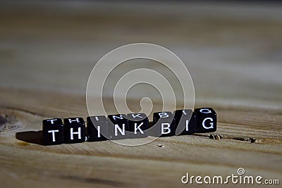 Think big on wooden blocks. Motivation and inspiration concept Stock Photo