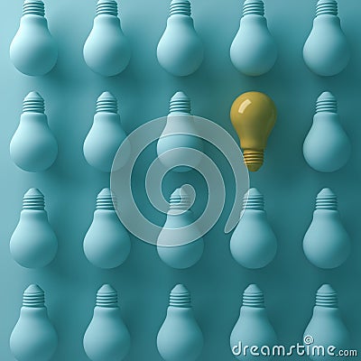 Think different concept , One yellow light bulb stand out from unlit green incandescent lightbulbs Stock Photo