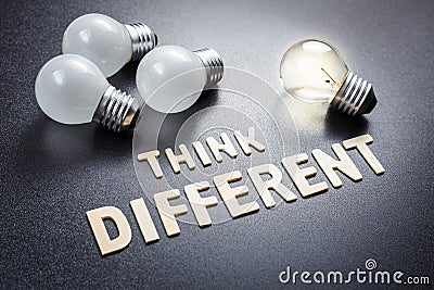 Think Different and Different Bulb Stock Photo