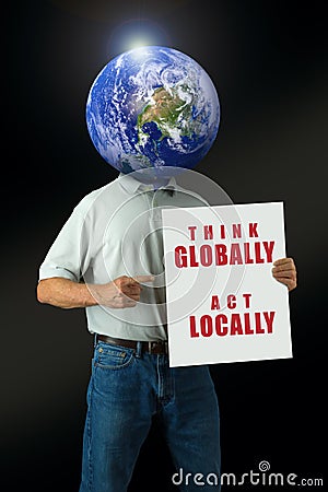 Think Globally Act Locally environmental message man with Earth head Stock Photo