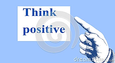 `Think positive`. The direction of the finger points to a motivational and inspirational message. Stock Photo
